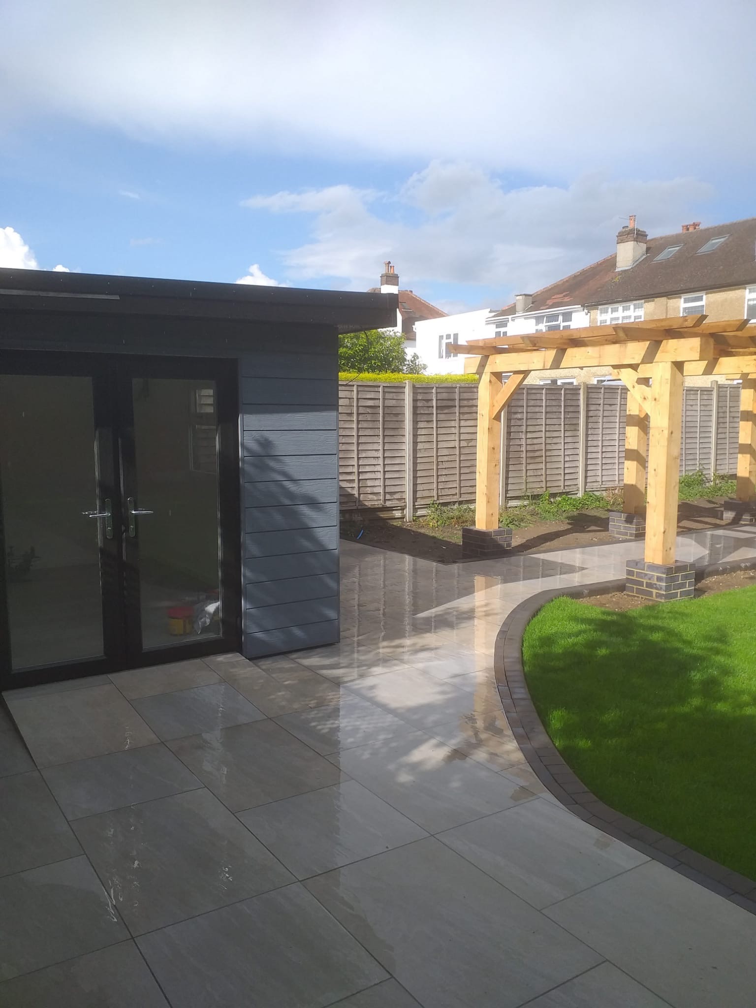 Garden office with landscaping and pergola